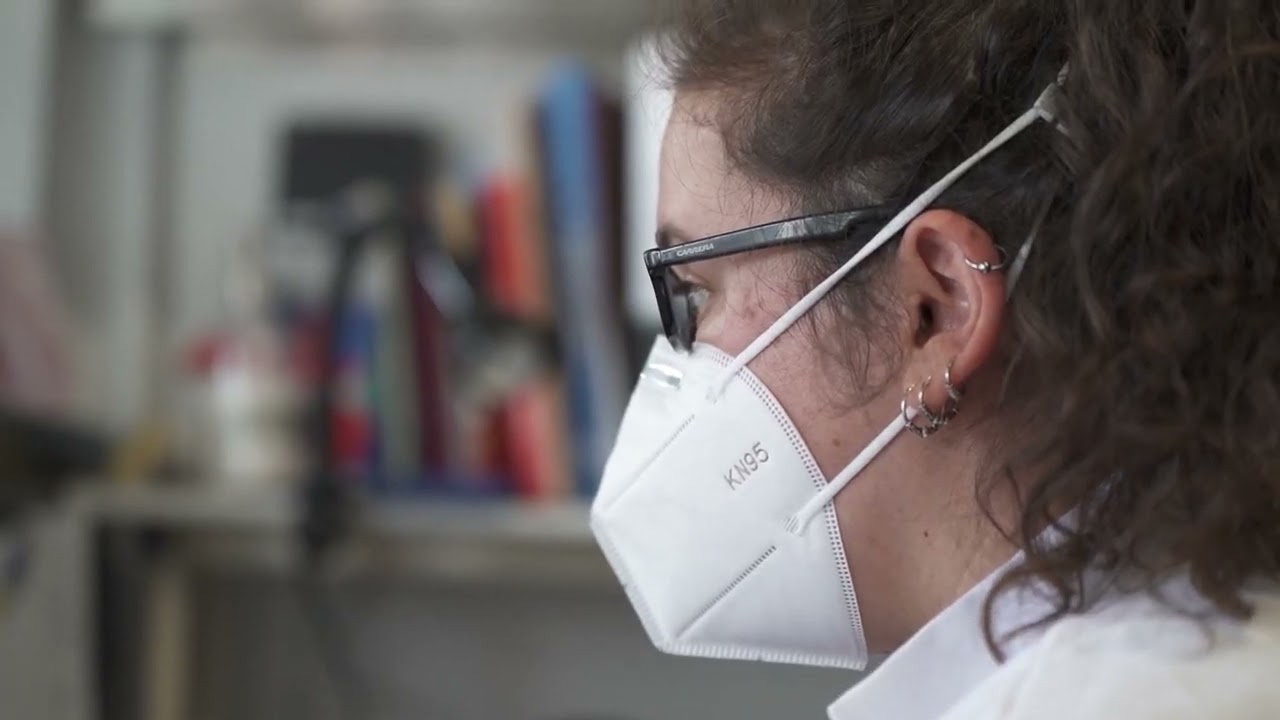 A Tetraneuron employee wearing a mask